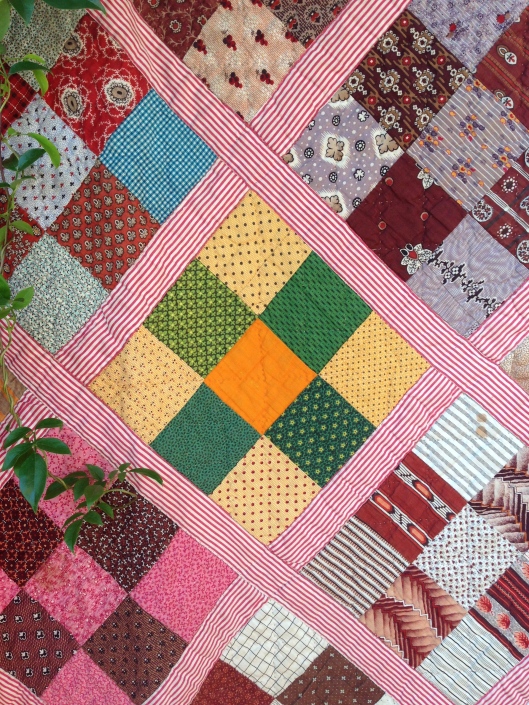 Detail of the nine patch blocks and sashing
