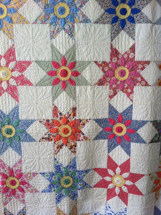 Missouri Daisy quilt made with reproduction and vintage fabrics. Includes some feed sacks.  