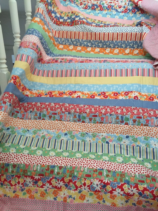 Jelly roll quilt - machine quilting in progress.