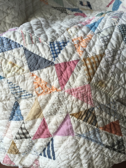 Detail of fabrics and hand quilting